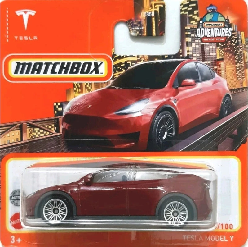 Matchbox Tesla Model Y red toy car in clear blister box, white and orange packaging
