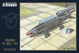 Gray model rocket kit with stand, small wheels and launch skid