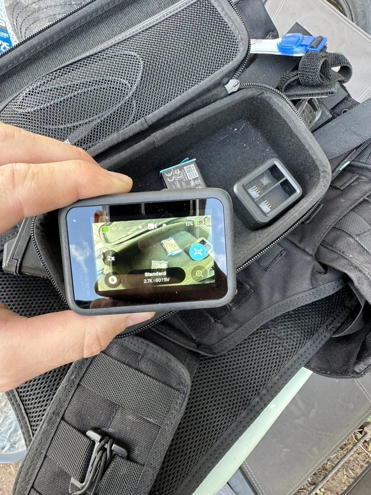GoPro HERO9 Black action camera with touch screen in gray protective case