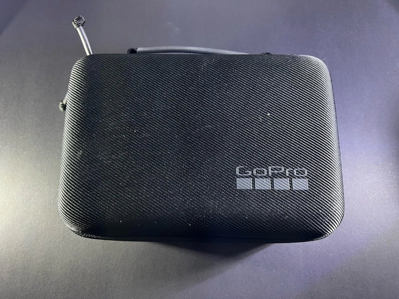 Black textured GoPro protective case with zipper and embossed HERO logo