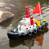 Red and white remote control jet boat model with twin vortex jets and deck details