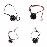 Drone front and rear power motors with wired connectors, circular black parts