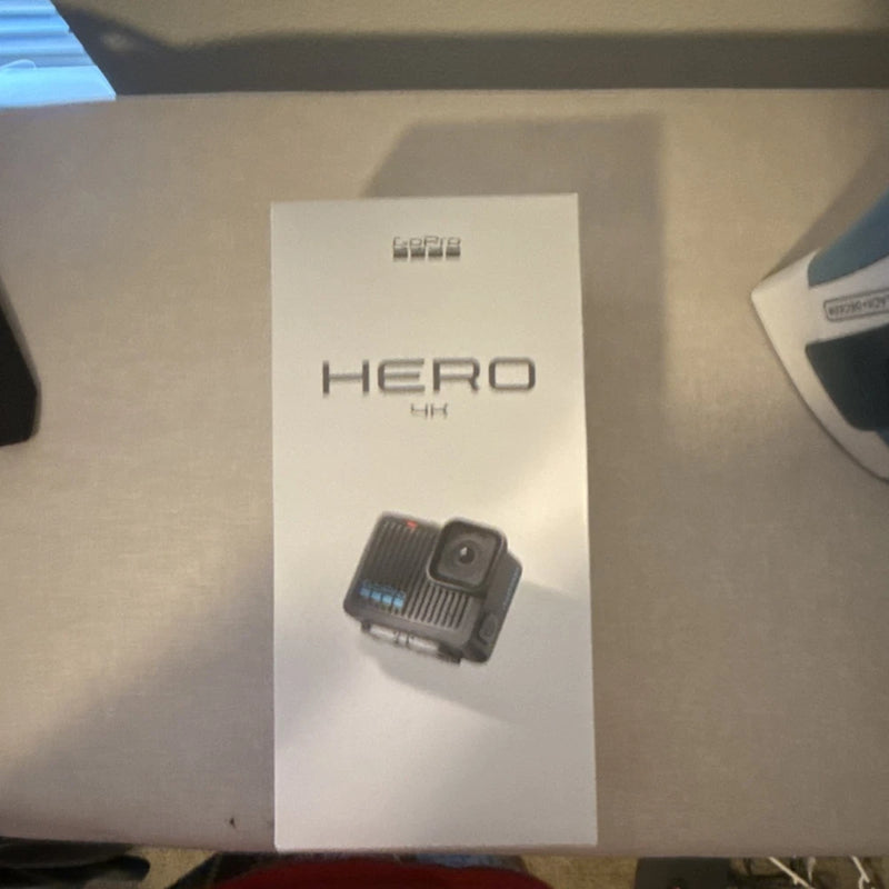 GoPro HERO action camera pictured on product box insert, black