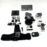 GoPro Hero 3 action camera bundle with mount, remote, extra batteries and accessories