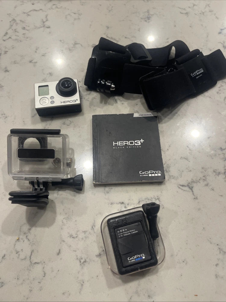 GoPro HERO3+ action camera kit with waterproof housing and mounting accessories