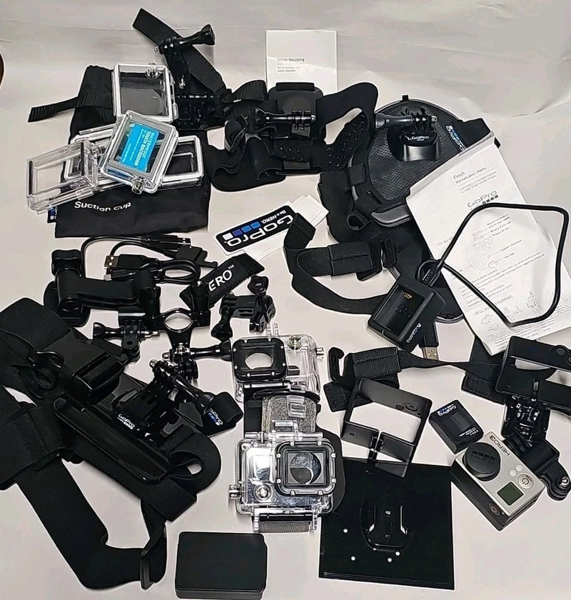 GoPro HERO3 silver action camera kit with waterproof housing, mounts, brackets, and accessories