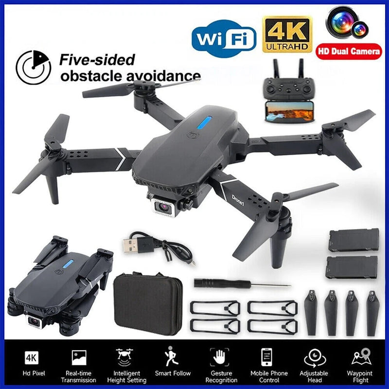 Foldable gray quadcopter drone kit with camera, remote, batteries, and carrying case