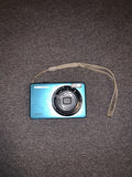 Samsung blue compact digital camera with 10.2MP lens and strap
