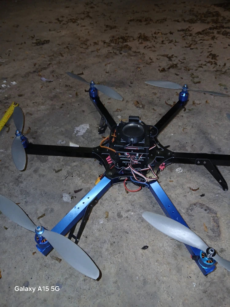 Hexacopter drone with six propellers and blue body arms