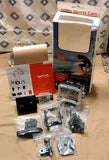 Black waterproof action camera with accessories and mounting kit, in retail box