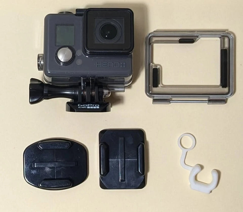 GoPro HERO+ action camera with clear waterproof housing case and mounting parts set