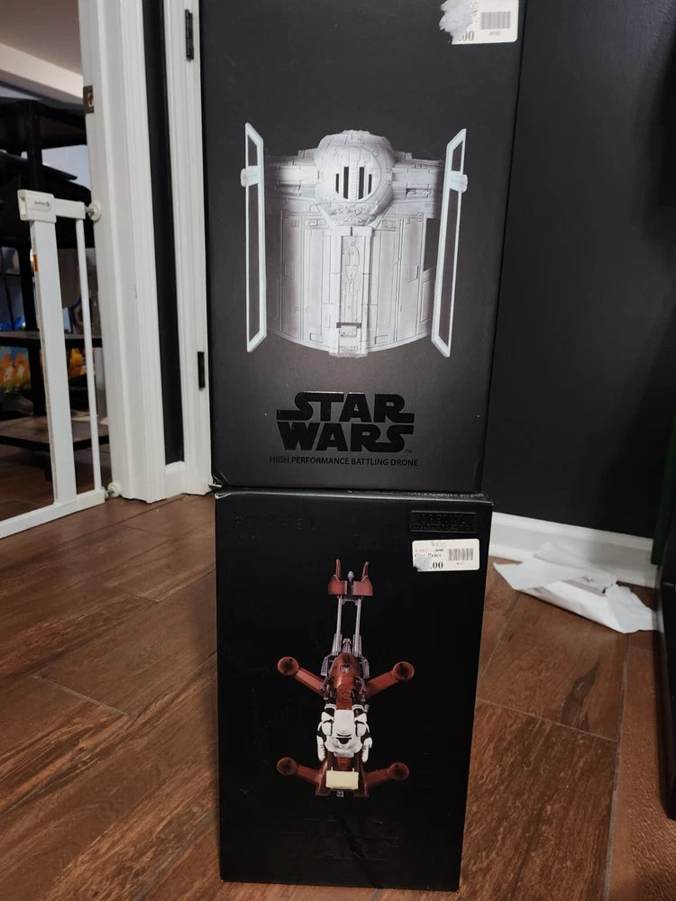 Star Wars battle drone toy in retail package, white and black box with character art