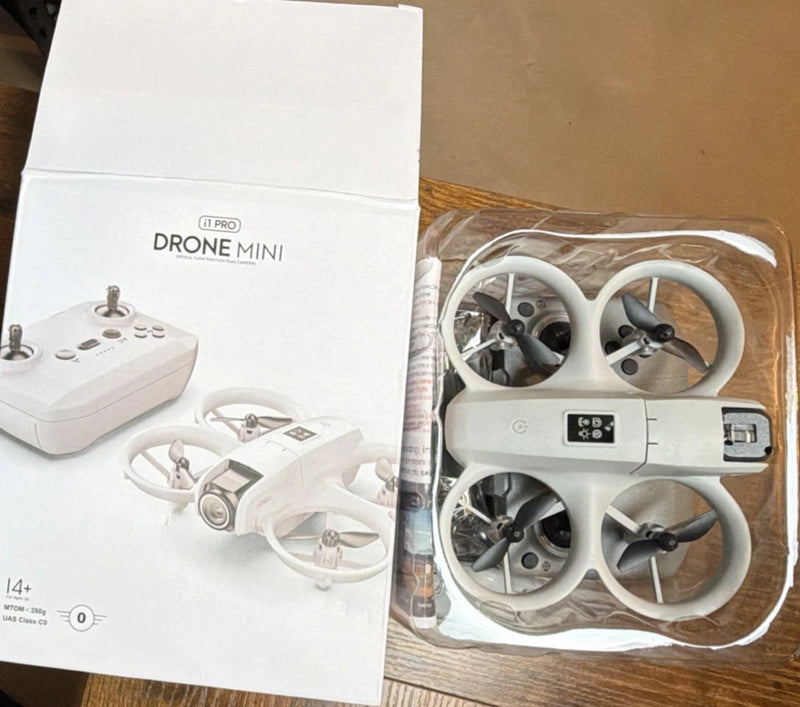 Mini quadcopter drone with controller, four foldable propellers and dual cameras