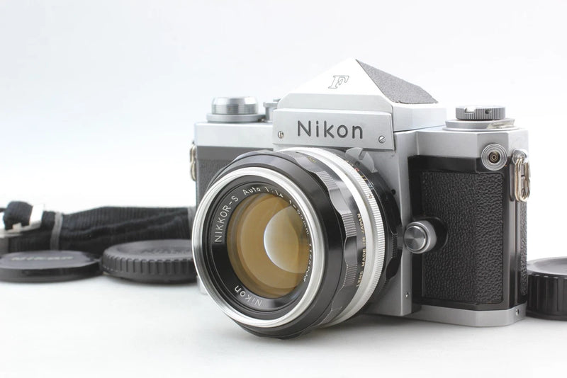 Nikon F silver SLR film camera with 50mm f/1.4 lens and black leatherette body