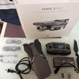 Drone bundle with Mavic 2 Pro drone, controller, battery, cables, and prop guards