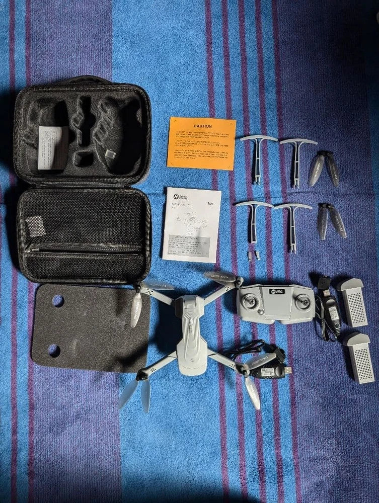 Foldable GPS FPV drone with camera and compact carrying case with accessories