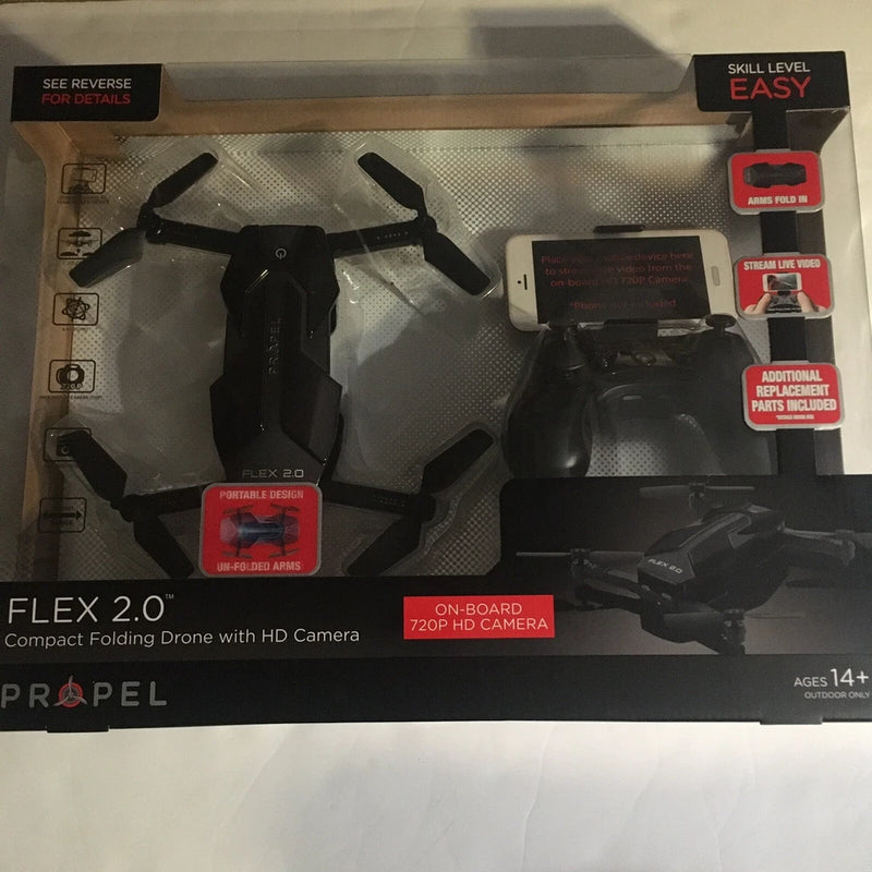 Compact folding drone with HD camera, shown in retail box with propellers