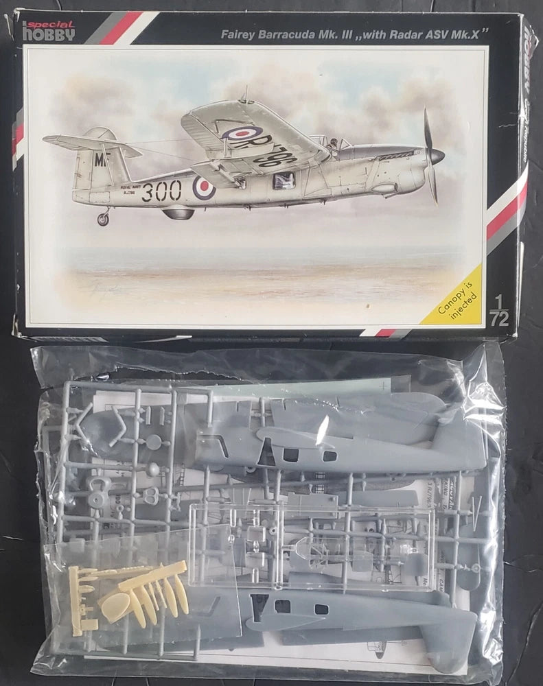 Navy military aircraft model kit with boxed parts and plastic sprues, scale 1:72