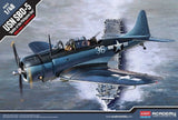 Blue 1/48 scale WWII aircraft model kit with US star insignia and propeller nose
