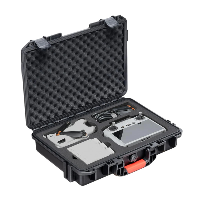 Hard shell drone case with foam insert, open lid and molded compartments, dark