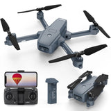 Quadcopter drone with camera, gray body, four propellers, remote controller and phone display