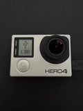 GoPro HERO 4 Silver Bundle ?C 3 Batteries, 64GB SD, Mounts, 2 Cases ?C Tested
