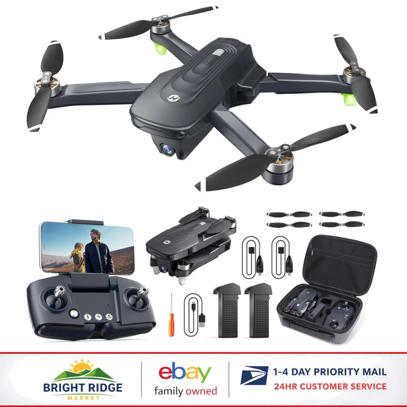 Foldable RC quadcopter drone with 4 rotors, remote, batteries and carry case kit