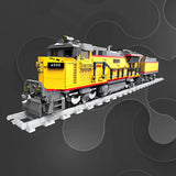 RC diesel locomotive model building blocks toy, yellow engine on gray track base