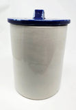 Blue-lidded stoneware crock jar with white body and knobbed lid