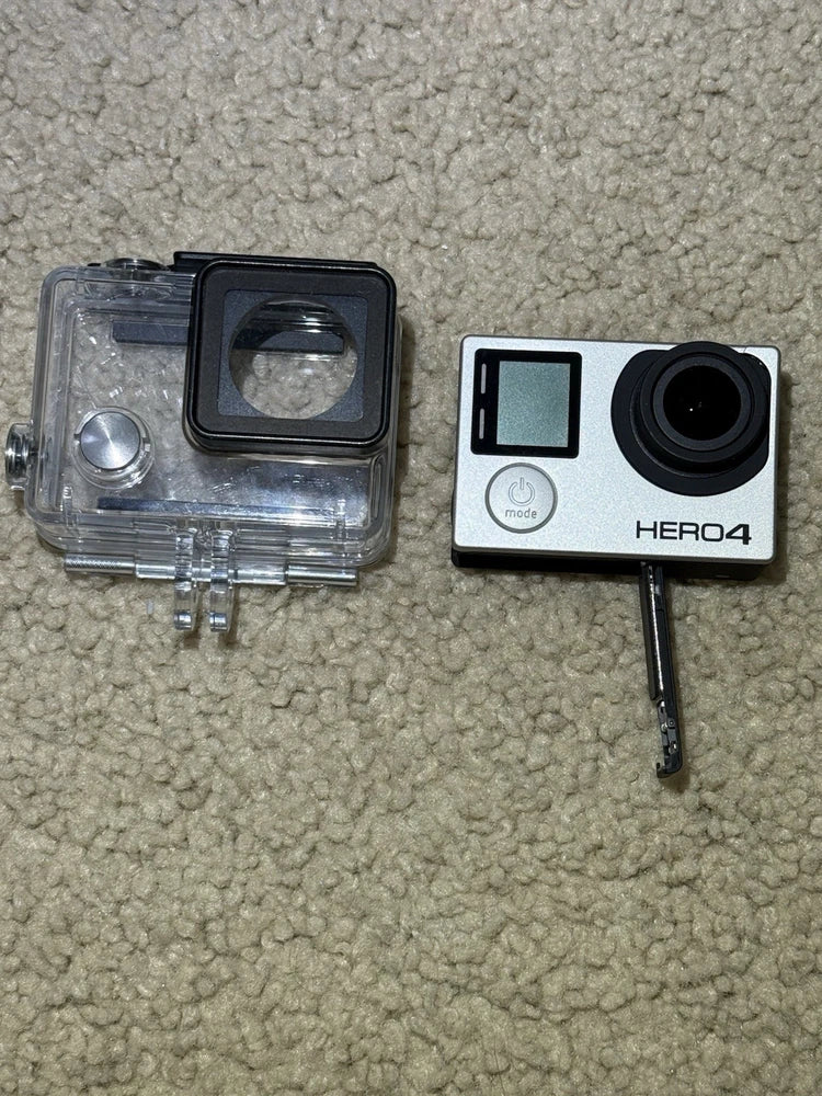 GoPro HERO4 Black action camera with waterproof housing, lens and buttons