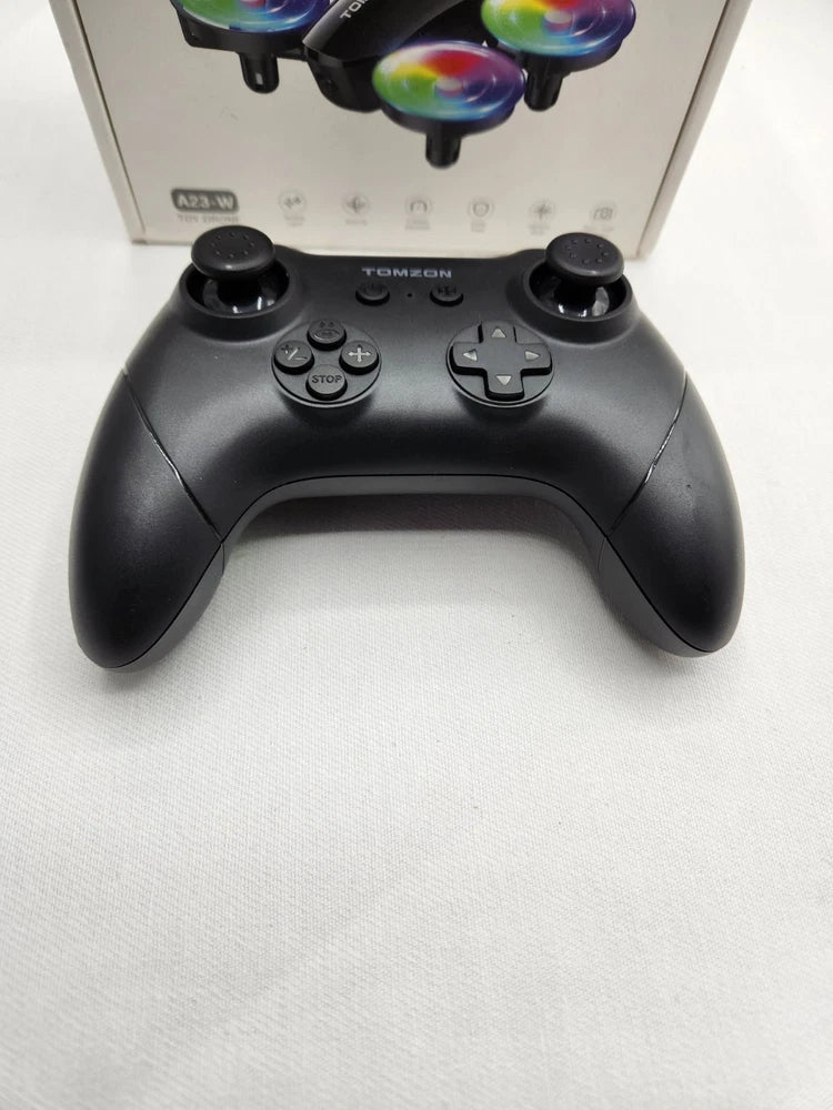 Black mini drone replacement remote controller with dual thumbsticks and buttons