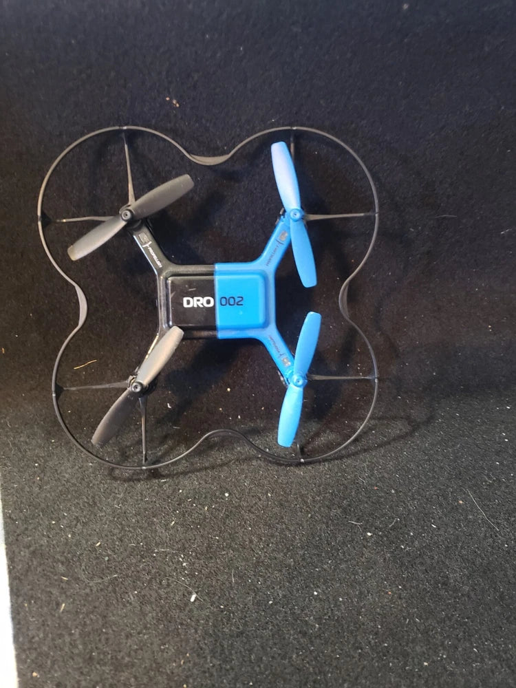 Mini blue quadcopter R/C drone with four propellers, for parts or repair