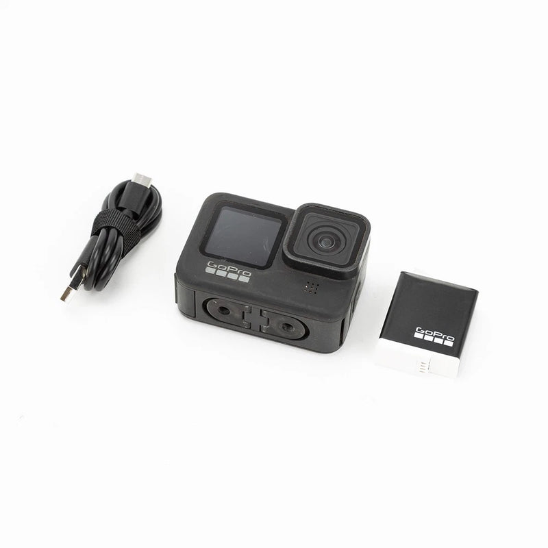 GoPro HERO9 Black action camera with accessories and charging cable