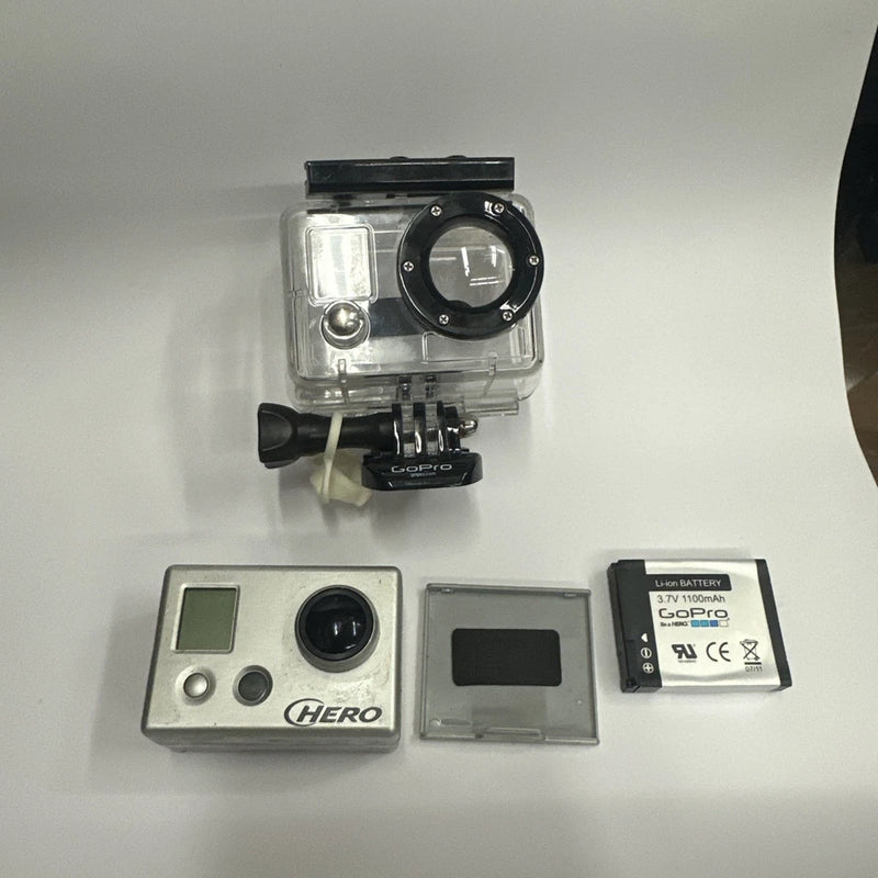 Action camcorder kit with clear waterproof housing, HERO label, and battery