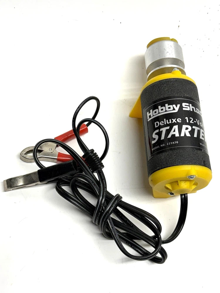 Hobby Shack Deluxe 12-Volt starter with yellow cylinder, black power cord, and metal clips