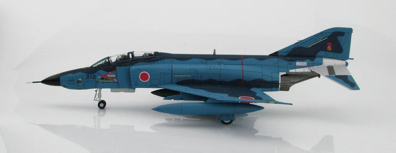Blue and dark gray fighter jet model with Japanese markings, landing gear, side view
