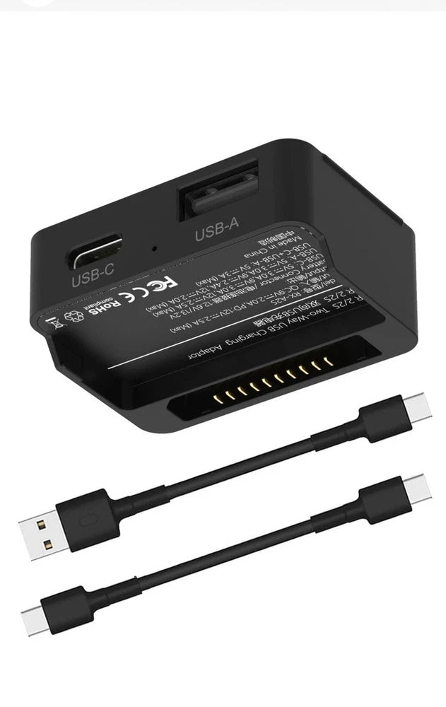 Mini USB charger adapter with USB-A port and two USB cables, compact black design