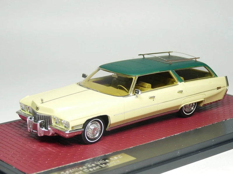 1:43 scale 1972 Cadillac DeVille station wagon model in cream with green roof