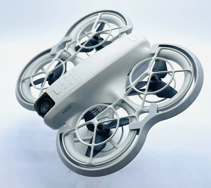 Gray duct bumper prop guard protector for drone, with four protected propellers