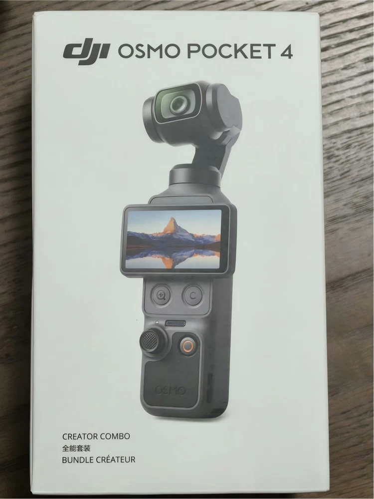 DJI Osmo Pocket 4 Creator Combo retail box with handheld gimbal camera and screen