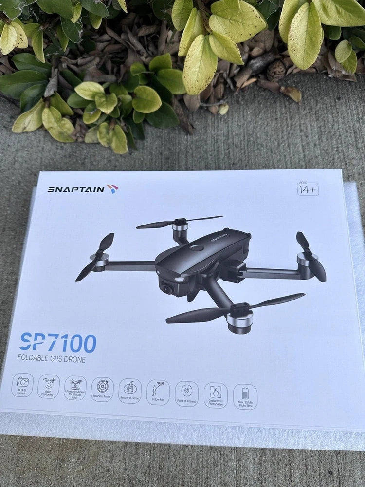 Snaptain SP7100 foldable GPS drone retail box with printed quadcopter