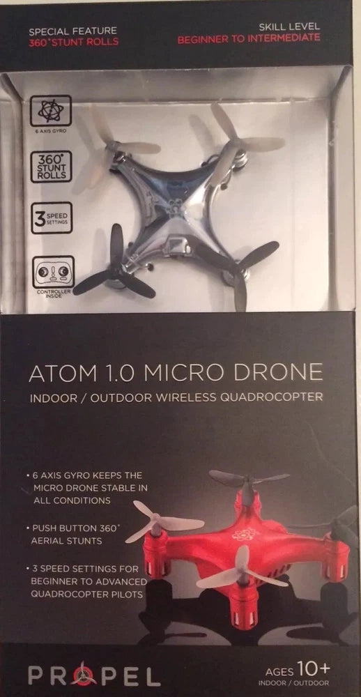 Gray quadcopter micro drone with four propellers and front LED, for indoor/outdoor