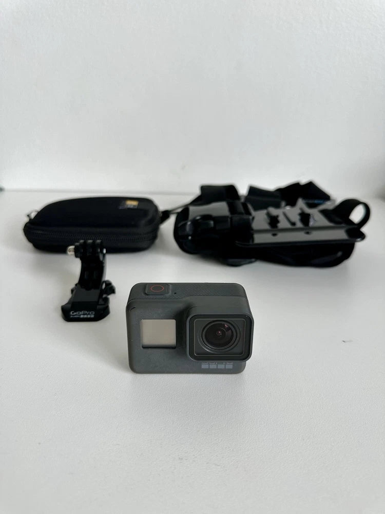 HERO5 action camera kit with gray camera, protective case, chest mount strap, mini mounts