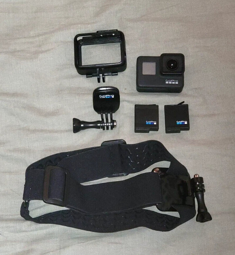 GoPro Hero7 Black action camera kit with head strap, housing, mounts, and two batteries