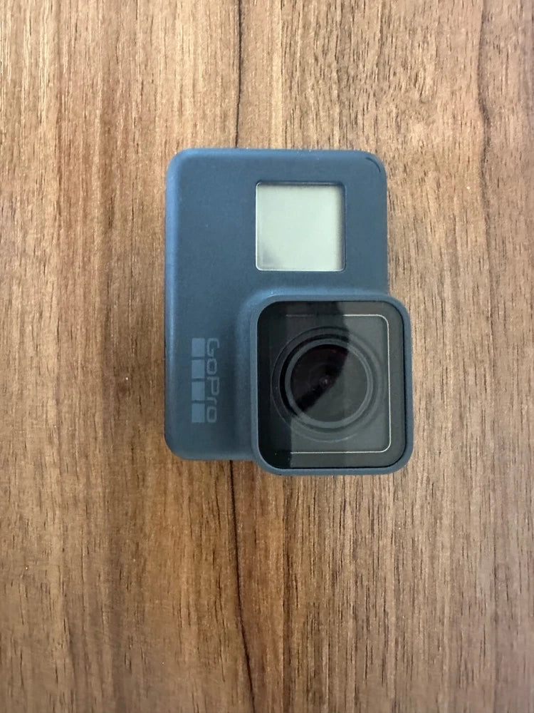 GoPro Hero 5 action camera with front lens and blue protective housing