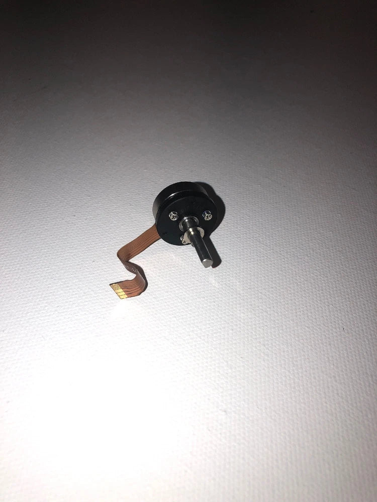 Yaw motor for DJI Phantom 3 with black circular body and wire connector