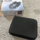 Black hard-shell drone carry case with zippered closure