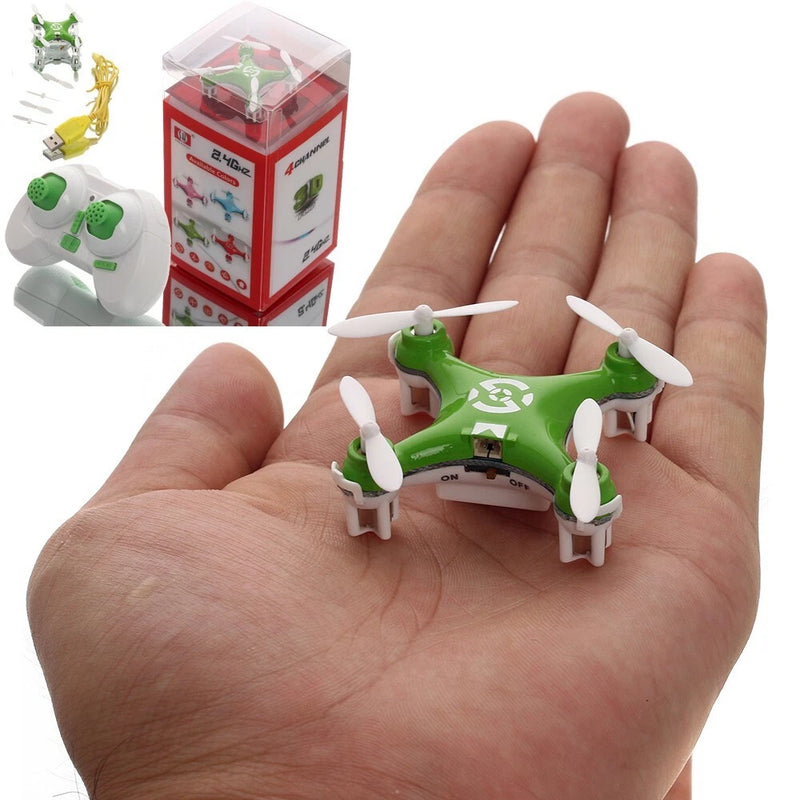 Mini green quadcopter RC toy drone with four white propellers