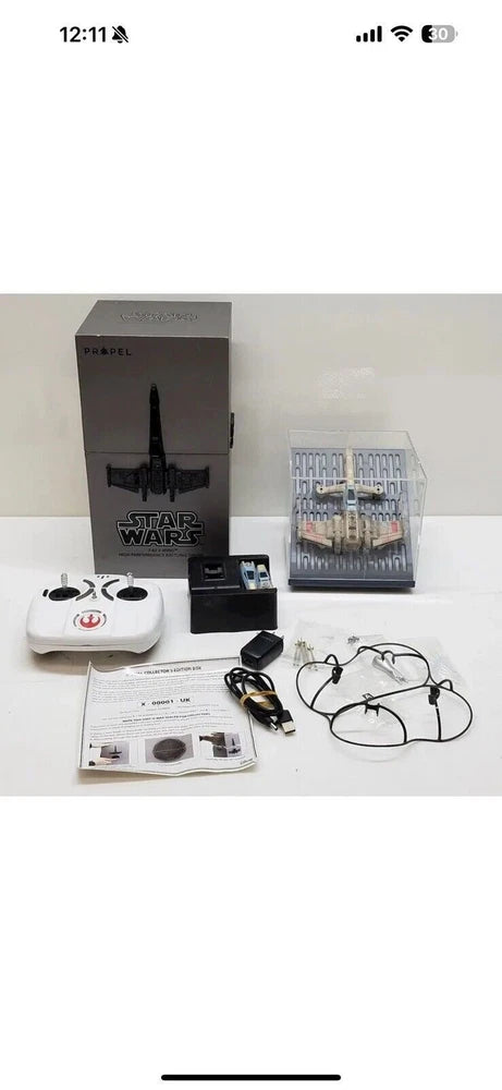 T-65 X-Wing battle drone collector kit with remote, controller, cables, manual