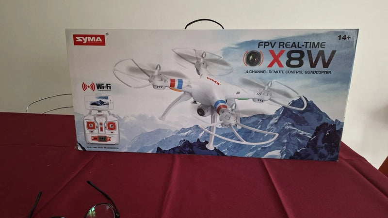 FPV drone product box with Syma branding and X8W illustration